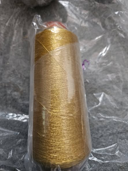 Cone of gold plated passing thread