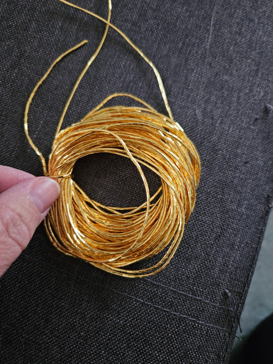 10 yard coil of gold plated couching cord
